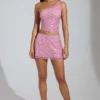 Adhara Verzierter A-Linien-Micro-Mini-Rock mit niedriger Leibhöhe in Rosa