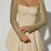 Aletta Minikleid mit verziertem Bubble-Saum in Gold Aletta Minikleid mit verziertem Bubble-Saum in Gold