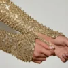 Aletta Minikleid mit verziertem Bubble-Saum in Gold Aletta Minikleid mit verziertem Bubble-Saum in Gold
