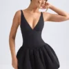 Anahita Schnür-Mikro-Minikleid mit Bubble-Saum und Korsett in Schwarz Anahita Schnür-Mikro-Minikleid mit Bubble-Saum und Korsett in Schwarz