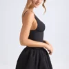 Anahita Schnür-Mikro-Minikleid mit Bubble-Saum und Korsett in Schwarz Anahita Schnür-Mikro-Minikleid mit Bubble-Saum und Korsett in Schwarz