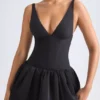 Anahita Schnür-Mikro-Minikleid mit Bubble-Saum und Korsett in Schwarz Anahita Schnür-Mikro-Minikleid mit Bubble-Saum und Korsett in Schwarz