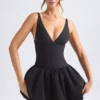 Anahita Schnür-Mikro-Minikleid mit Bubble-Saum und Korsett in Schwarz Anahita Schnür-Mikro-Minikleid mit Bubble-Saum und Korsett in Schwarz