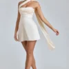 Anastasia – Drapiertes Satin-Minikleid mit Neckholder in Elfenbein Anastasia – Drapiertes Satin-Minikleid mit Neckholder in Elfenbein