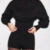 Anele Strick-Cardigan mit langen Ärmeln in Schwarz Anele Strick-Cardigan mit langen Ärmeln in Schwarz
