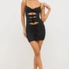Aniela Slinky Jersey Rose Detail Cut-Out-Minikleid in Schwarz Aniela Slinky Jersey Rose Detail Cut-Out-Minikleid in Schwarz