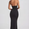 Apolline Rüschen-Halterkleid in Schwarz Apolline Rüschen-Halterkleid in Schwarz