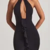 Apolline Rüschen-Halterkleid in Schwarz Apolline Rüschen-Halterkleid in Schwarz