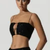 Ariana Oberteil mit Cut-outs und Verzierungen in Schwarz Ariana Oberteil mit Cut-outs und Verzierungen in Schwarz