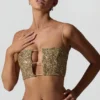 Ariana Verziertes Crop-Top mit Cut-outs in Gold Ariana Verziertes Crop-Top mit Cut-outs in Gold