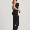 Arlena Jumpsuit mit Schleifendetail und ausgestellter Passform aus Spitze in Schwarz