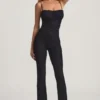 Arlena Jumpsuit mit Schleifendetail und ausgestellter Passform aus Spitze in Schwarz