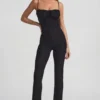 Arlena Jumpsuit mit Schleifendetail und ausgestellter Passform aus Spitze in Schwarz