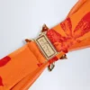 Baracoa Bikinioberteil mit Metallverzierung und Neckholder in Orange mit Orchideenprint Baracoa Bikinioberteil mit Metallverzierung und Neckholder in Orange mit Orchideenprint