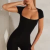 Bea Unitard mit Flügelärmeln und quadratischem Ausschnitt in Schwarz Bea Unitard mit Flügelärmeln und quadratischem Ausschnitt in Schwarz