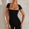 Bea Unitard mit Flügelärmeln und quadratischem Ausschnitt in Schwarz Bea Unitard mit Flügelärmeln und quadratischem Ausschnitt in Schwarz