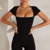Bea Unitard mit Flügelärmeln und quadratischem Ausschnitt in Schwarz Bea Unitard mit Flügelärmeln und quadratischem Ausschnitt in Schwarz