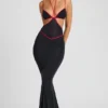 Bella Abendkleid mit kontrastierenden Einfassungen und Cut-outs in Schwarz Bella Abendkleid mit kontrastierenden Einfassungen und Cut-outs in Schwarz