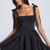 Bellamy Drapiertes Korsett-Minikleid in Schwarz Bellamy Drapiertes Korsett-Minikleid in Schwarz