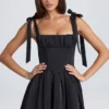 Bellamy Drapiertes Korsett-Minikleid in Schwarz Bellamy Drapiertes Korsett-Minikleid in Schwarz