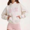 Übergroßer Hoodie mit Applikation in Elfenbein Übergroßer Hoodie mit Applikation in Elfenbein