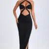 Bethania Maxikleid mit Ausschnitt und Metallverzierung in Schwarz Bethania Maxikleid mit Ausschnitt und Metallverzierung in Schwarz