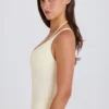 Body aus Stretch-Baumwolljersey mit überkreuztem Rücken in Creme Body aus Stretch-Baumwolljersey mit überkreuztem Rücken in Creme