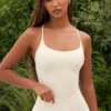Bodys mit Cut-outs in Creme
