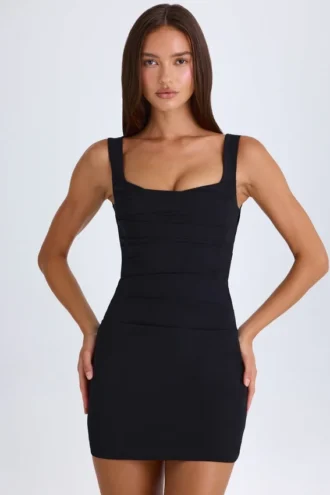 Brittany Drapiertes, strukturiertes Korsett-Minikleid in Schwarz