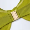 Bruny Bikini-Oberteil mit Biesen und Perlenverzierung in Olivgrün Bruny Bikini-Oberteil mit Biesen und Perlenverzierung in Olivgrün