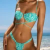 Cagliari Bikinihosen mit Rüschen in Blau mit Multicolor-Print Cagliari Bikinihosen mit Rüschen in Blau mit Multicolor-Print