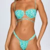 Cagliari Bikinihosen mit Rüschen in Blau mit Multicolor-Print Cagliari Bikinihosen mit Rüschen in Blau mit Multicolor-Print