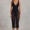 Caia Transparentes Spitzen-Bodys mit Wellenrand und tiefem Ausschnitt in Schwarz Caia Transparentes Spitzen-Bodys mit Wellenrand und tiefem Ausschnitt in Schwarz