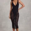Caia Transparentes Spitzen-Bodys mit Wellenrand und tiefem Ausschnitt in Schwarz Caia Transparentes Spitzen-Bodys mit Wellenrand und tiefem Ausschnitt in Schwarz