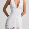 Calina A-Linien-Minikleid aus Baumwollpopeline mit Cutwork-Verzierung in Weiß Calina A-Linien-Minikleid aus Baumwollpopeline mit Cutwork-Verzierung in Weiß