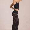 Calista Sheer Lace Mid-Rise Flared Trousers in Schwarz