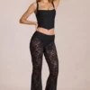 Calista Sheer Lace Mid-Rise Flared Trousers in Schwarz