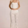 Calista Transparente Spitzenhose mit mittlerer Leibhöhe und ausgestelltem Bein in Elfenbein