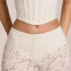 Calista Transparente Spitzenhose mit mittlerer Leibhöhe und ausgestelltem Bein in Elfenbein