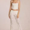 Calista Transparente Spitzenhose mit mittlerer Leibhöhe und ausgestelltem Bein in Elfenbein
