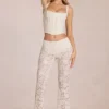 Calista Transparente Spitzenhose mit mittlerer Leibhöhe und ausgestelltem Bein in Elfenbein
