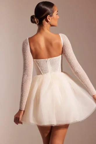 Calliope verziertes Minikleid mit langen Ärmeln und Tüllrock in Elfenbein