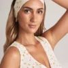 Candy Modal-Stirnband mit Rippenstruktur und Blumenmuster Candy Modal-Stirnband mit Rippenstruktur und Blumenmuster