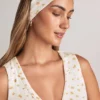 Candy Modal-Stirnband mit Rippenstruktur und Blumenmuster Candy Modal-Stirnband mit Rippenstruktur und Blumenmuster