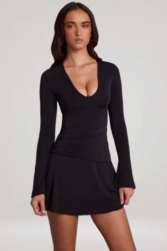 Carielle Minikleid aus weichem Jersey mit U-Ausschnitt und ausgestelltem Rock in Schwarz