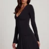 Carielle Minikleid aus weichem Jersey mit U-Ausschnitt und ausgestelltem Rock in Schwarz Carielle Minikleid aus weichem Jersey mit U-Ausschnitt und ausgestelltem Rock in Schwarz