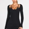 Caris – Langärmliges Minikleid aus geripptem Modal mit Schnür-BH in Schwarz Caris – Langärmliges Minikleid aus geripptem Modal mit Schnür-BH in Schwarz