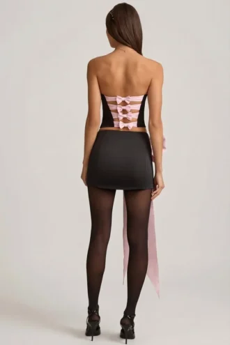 Carola Satin-Minirock mit Schleifendetail und niedriger Taille in Schwarz