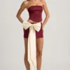 Carola Satin-Minirock mit Schleifenverzierung und niedriger Leibhöhe in Weinrot Carola Satin-Minirock mit Schleifenverzierung und niedriger Leibhöhe in Weinrot