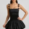 Cirilla Minikleid mit Rüschen und Schleife am Bubble-Saum in Schwarz Cirilla Minikleid mit Rüschen und Schleife am Bubble-Saum in Schwarz